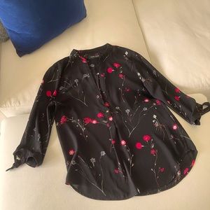 Black blouse with floral design